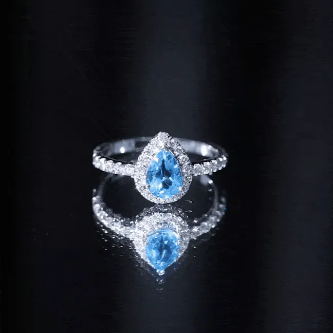 1.25 CT Swiss Blue Topaz Engagement Ring with Diamond Halo