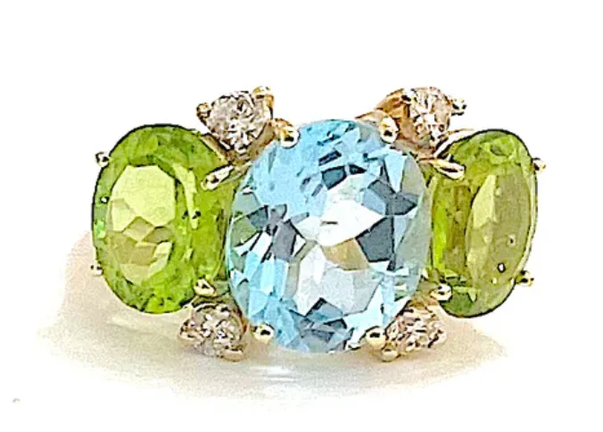 Amethyst and Peridot Yellow Gold Three-Stone Cushion Ring