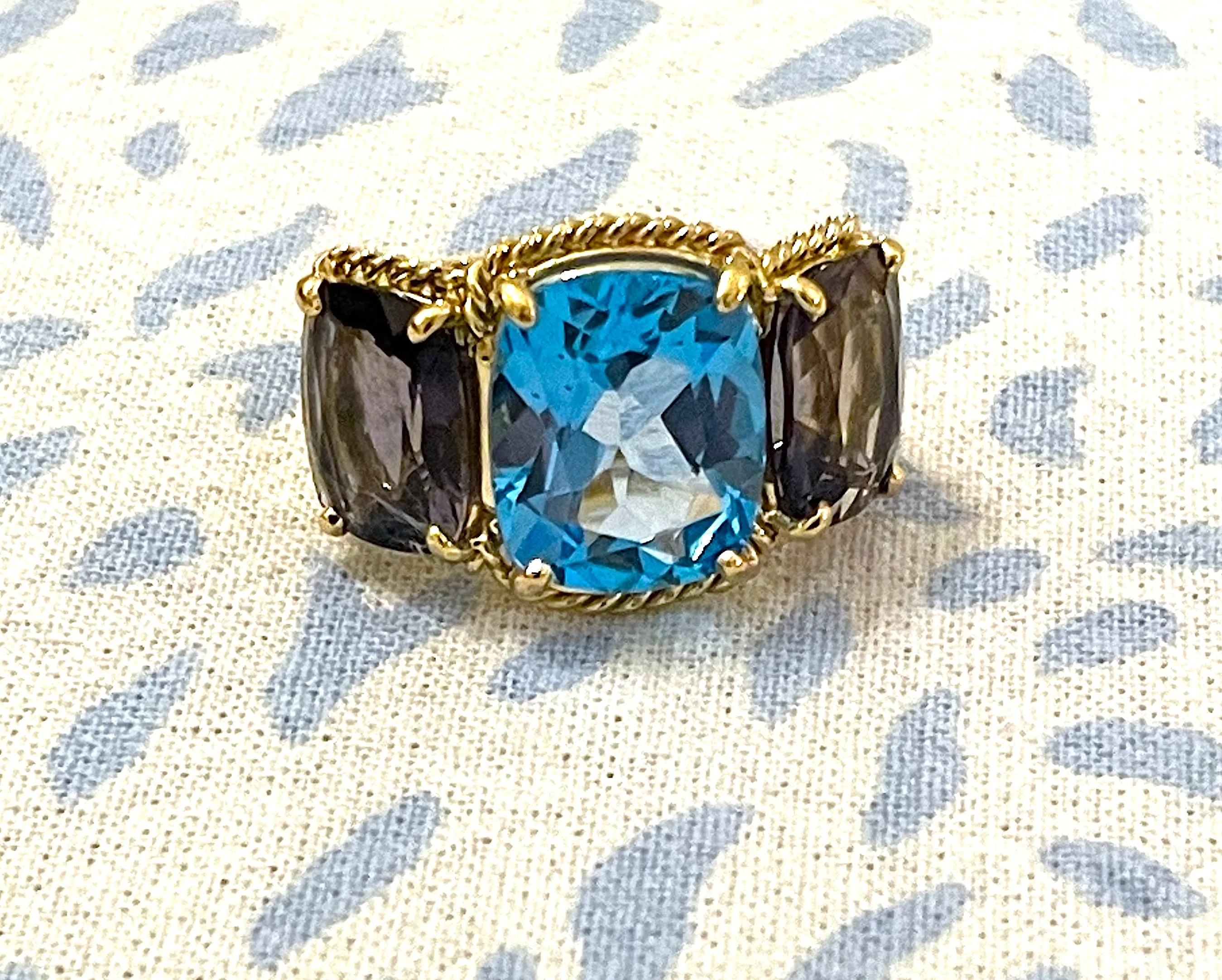 Blue Topaz and Iolite Three Stone Ring with Rope Twist Border