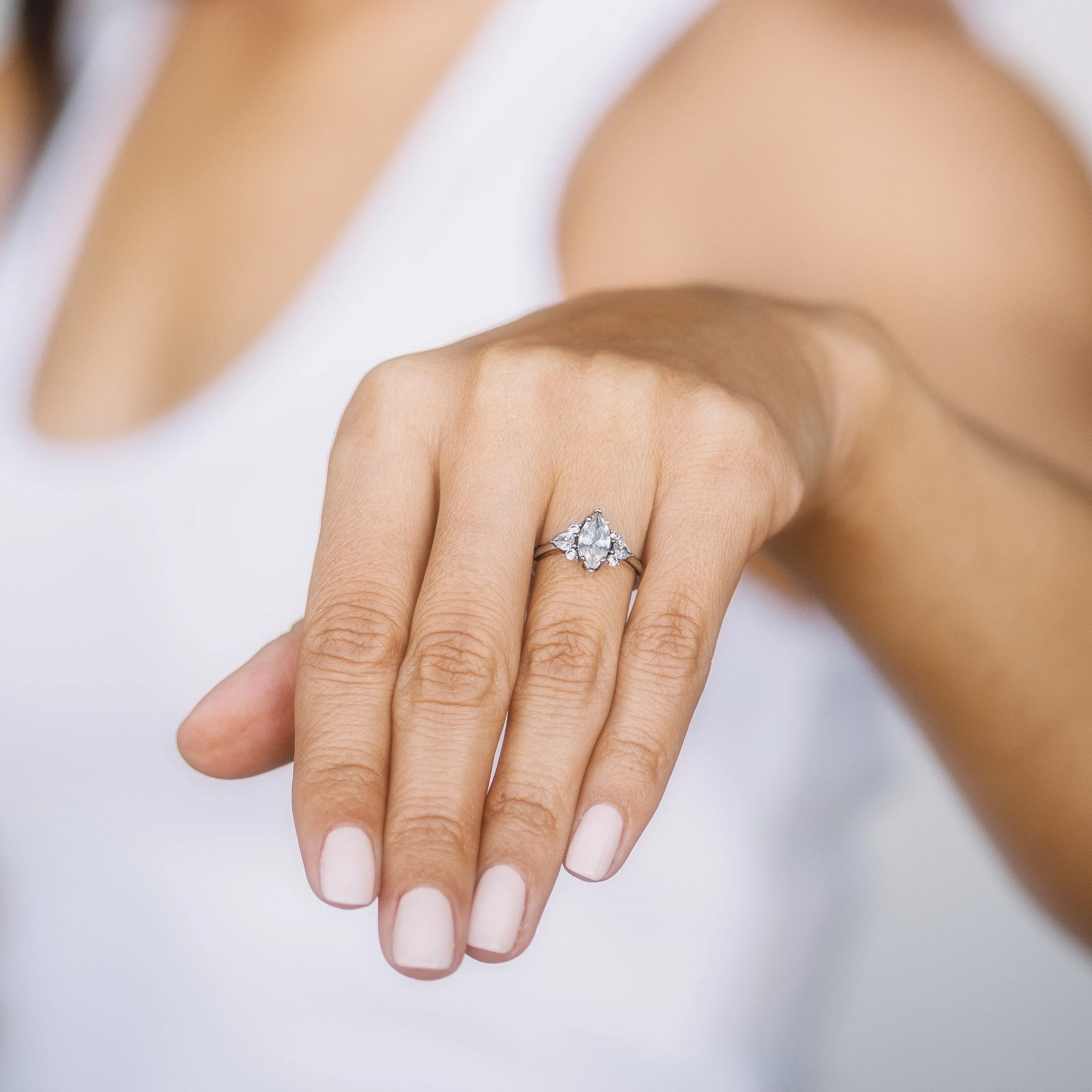 Marquise Solitaire Engagement Ring with Pear and Round Side Diamonds