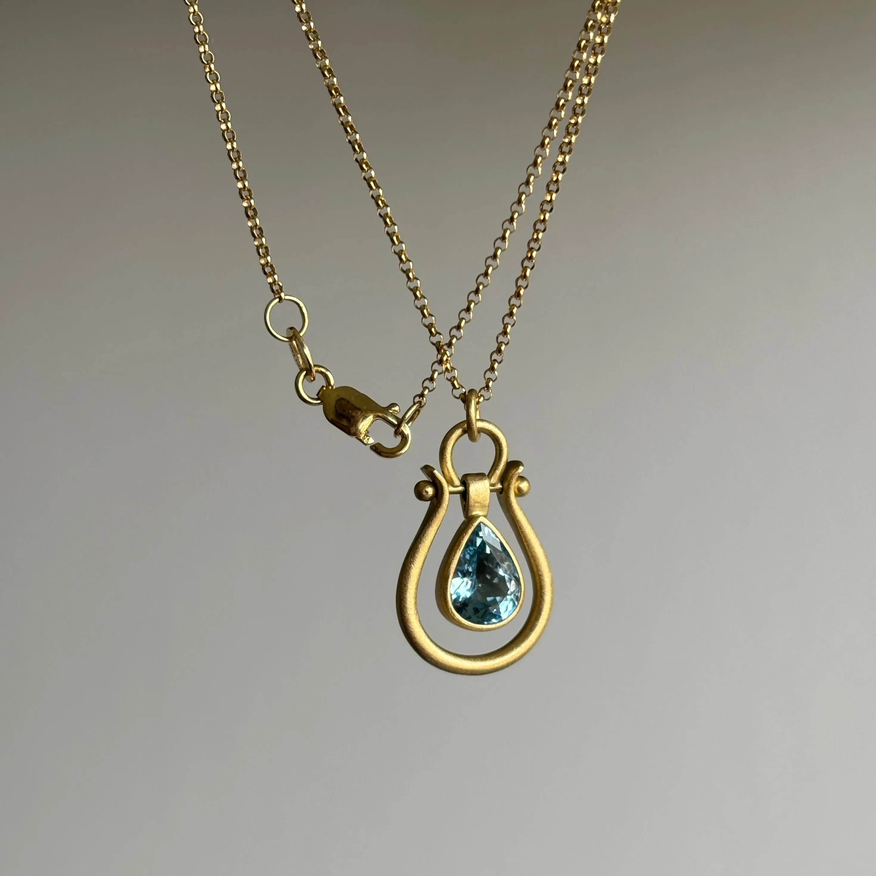 Small Gold Lyre Pendant with Aquamarine Pear