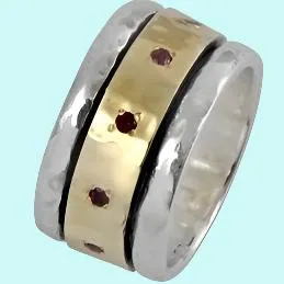 Spinner Ring for woman Jewelry. Sterling Silver and 9kt Gold Ring set with garnets.